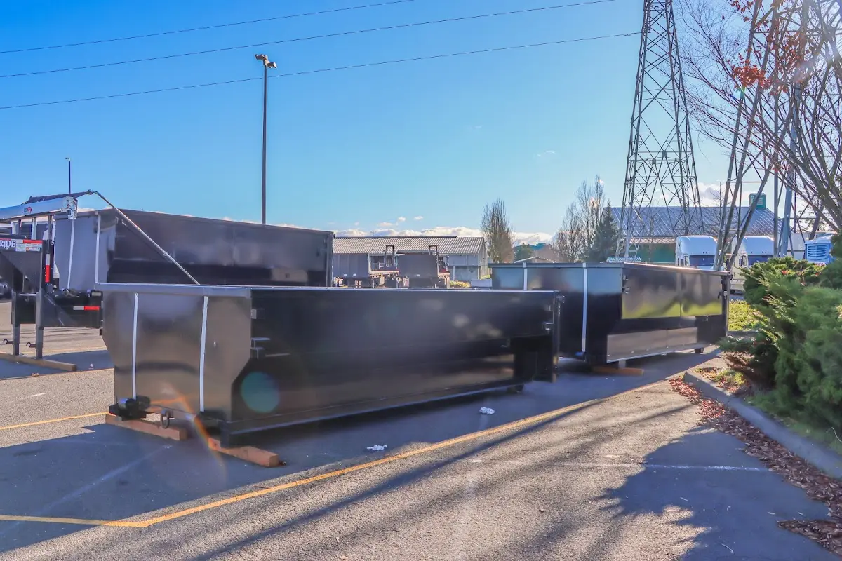 Roll-off dumpster ready for waste disposal at job site for Concrete Dumpster Rental in Slaton
